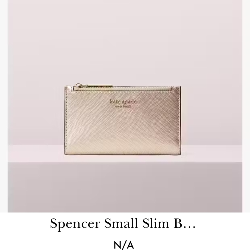 Kate Spade Spencer Sm Slim Wallet. Rose gold exterior, burgundy interior.